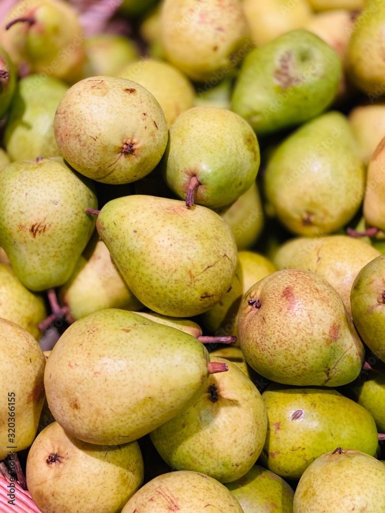 Many fresh green pears