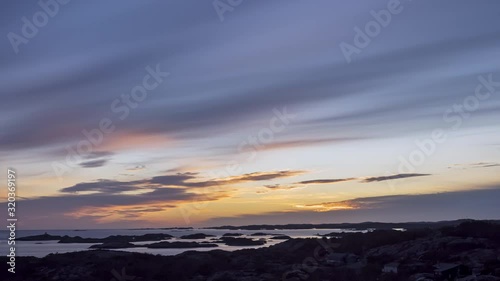 Timelapse of a gorgeous sunset over the southern coast of Norway photo