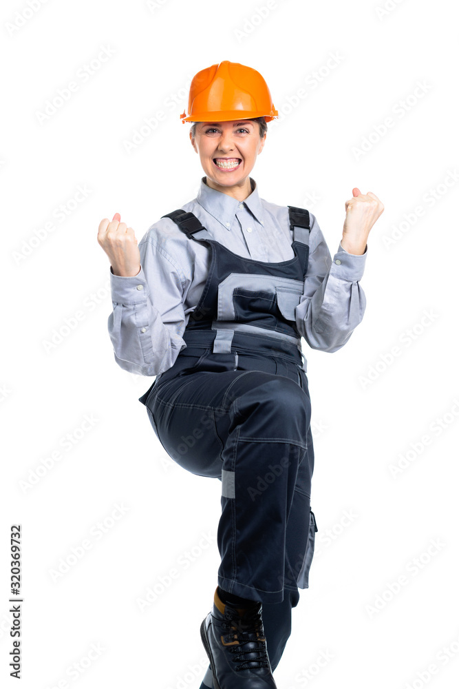 Female engineer builder rejoices in his success. Isolated Female engineer builder rejoices in his success. Isolated