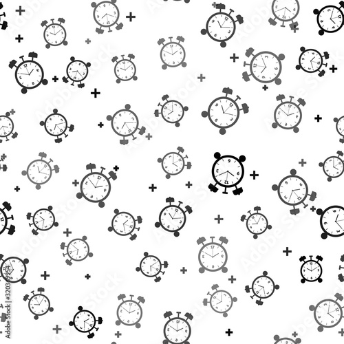 Black Alarm clock icon isolated seamless pattern on white background. Wake up, get up concept. Time sign. Vector Illustration