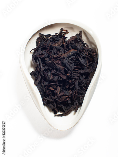 Da Hong Pao Big Red Robe Wuyi Shan roasted ooloong tea in the tea bowl isolated