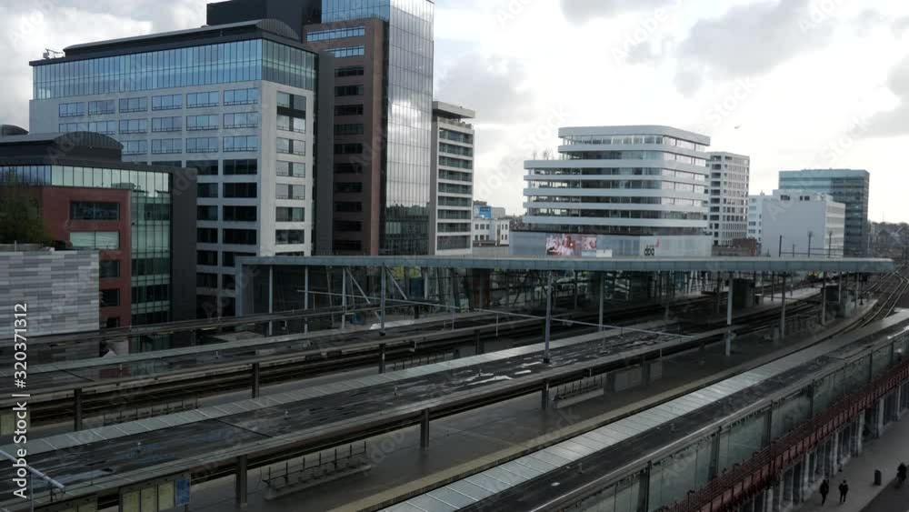 Belgian city skyline during the train is arriving at train station,static Belgian city skyline during the train is arriving at train station,static