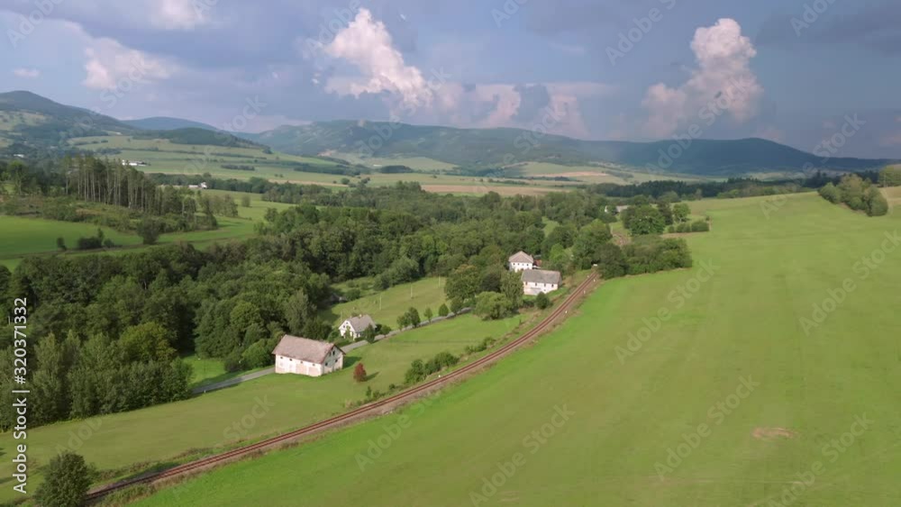 Drone shot of summer countryside with meadows and fields in Czech Republic Drone shot of summer countryside with meadows and fields in Czech Republic