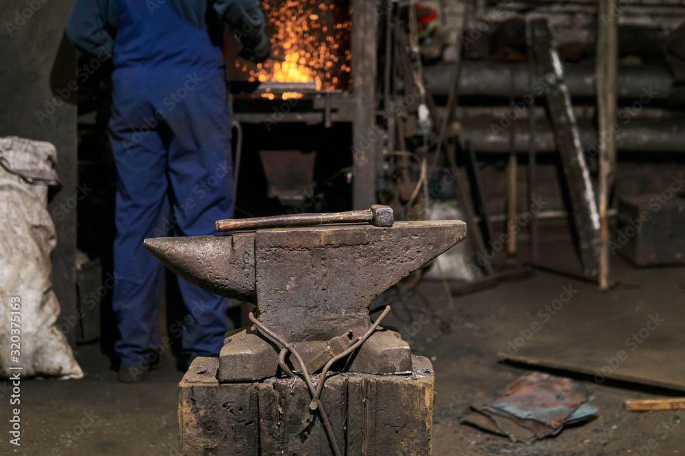 the hammer lies on the anvil in the forge while the blacksmith went to the furnace the hammer lies on the anvil in the forge while the blacksmith went to the furnace