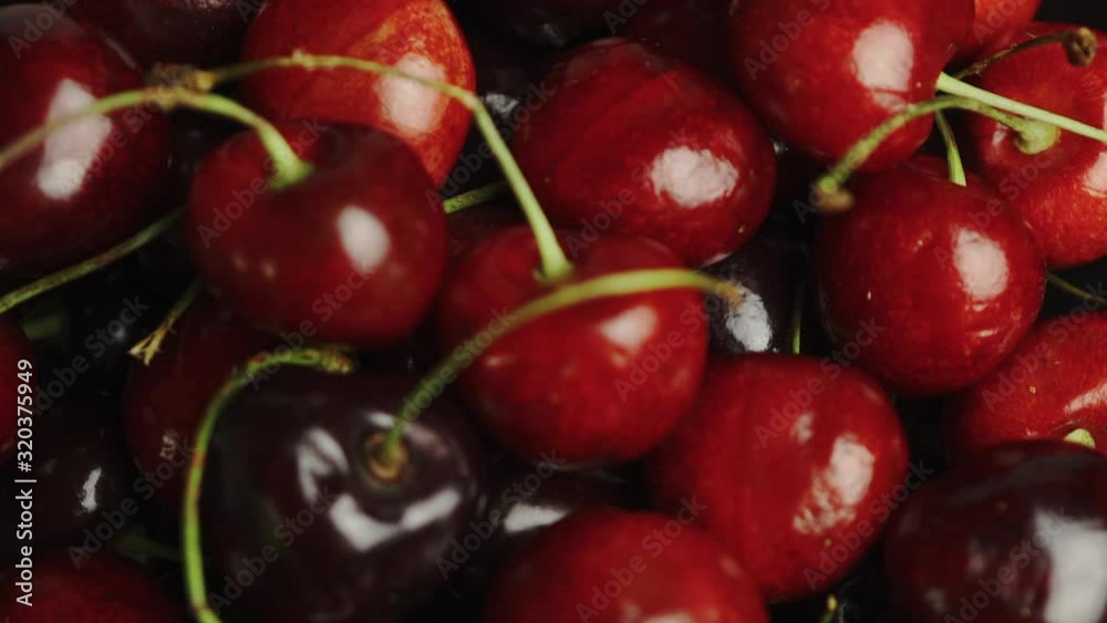 Tracking shot over bowl of cherries. Tracking shot over bowl of cherries.