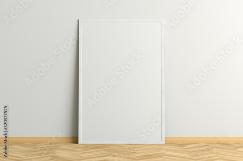 Blank vertical poster frame mock up standing on white floor next to white wall. Clipping path around poster. 3d illustration
