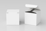 Blank white cube gift box with open and closed hinged flap lid on white background. Clipping path around box mock up. 3d illustration