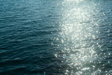 Sea water with sun sparkles