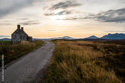 Ruined Cottage in Moorland with Scottish Mountains in the Distance