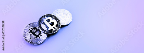 golden bitcoins on a blue background, panoramic mock-up