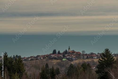 Svaty Jan nad Malsi village on hill in cloudy color day in south Bohemia photo