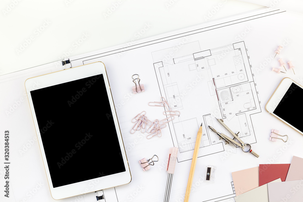 Interior designer table workplace with house plan Interior designer table workplace with house plan