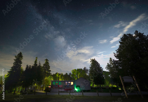 The Milky Way Rises Over A Cottage in Canada. © Travis