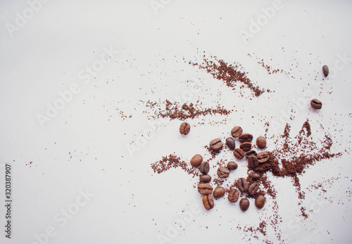 several coffee beans on a white background