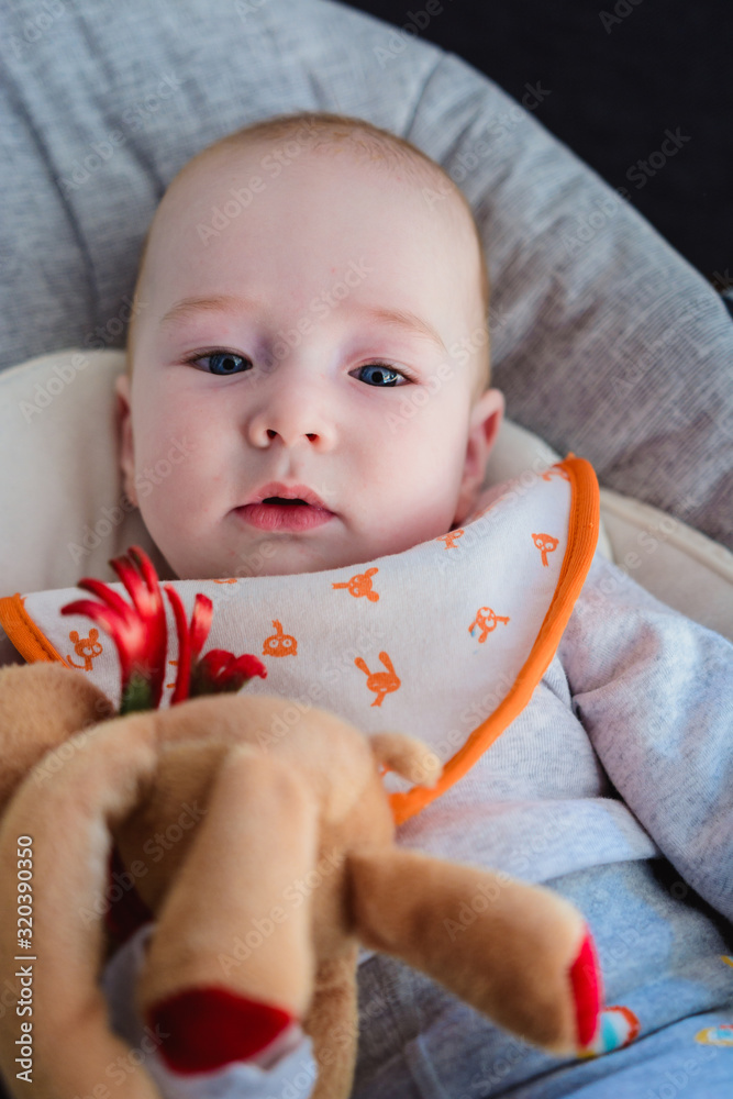 Young boy resting in the swing