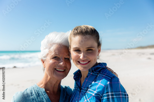 Grandmother and mother at the beach