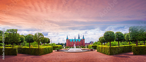 Obraz na płótnie beautiful landscape with fountain and magical incredible gardens and park Frederiksborg slot Castle near Copenhagen. Hillerod, Denmark at sunset. Popular tourist atraction. w salonie