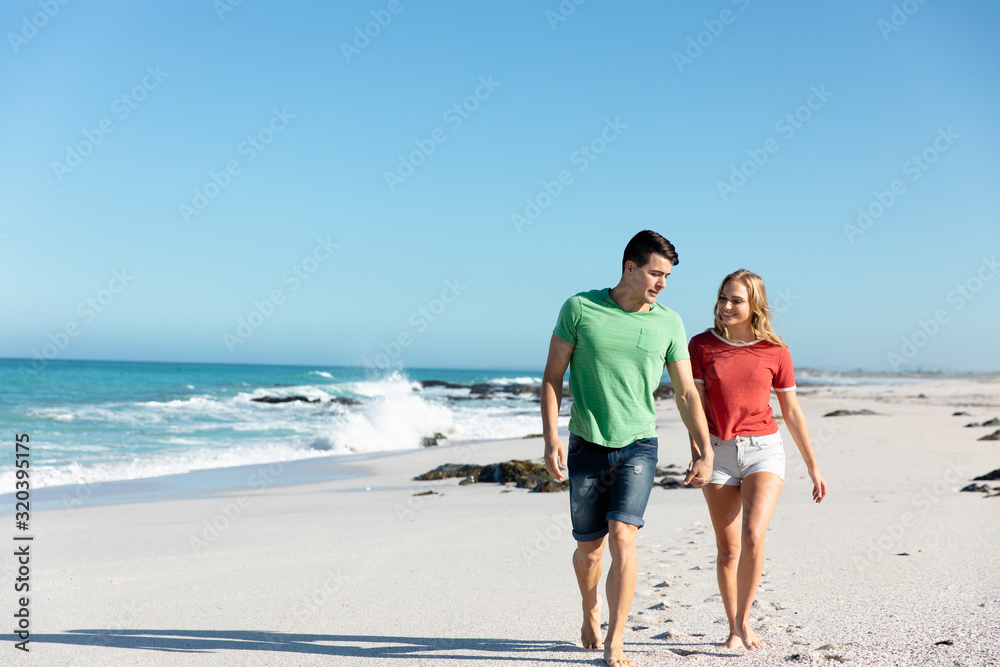 Young couple relaxing at the beach Young couple relaxing at the beach