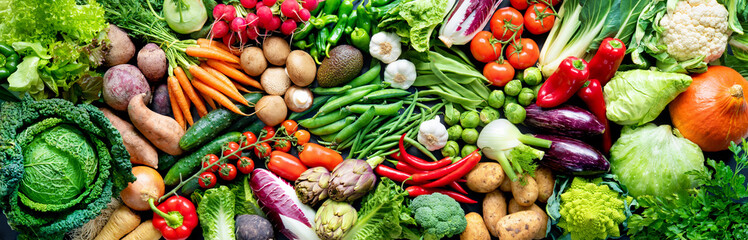 Food background with assortment of fresh organic vegetables