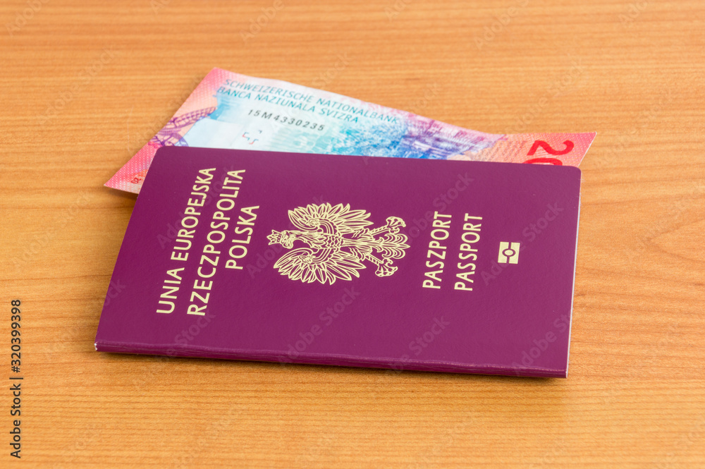 Polish biometric passport with 20 CHF banknote. Polish biometric passport with 20 CHF banknote.