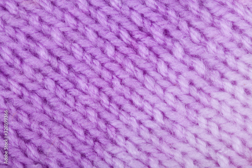 Knitted texture, woolen product, homework, hobbies, knitting, needlework.