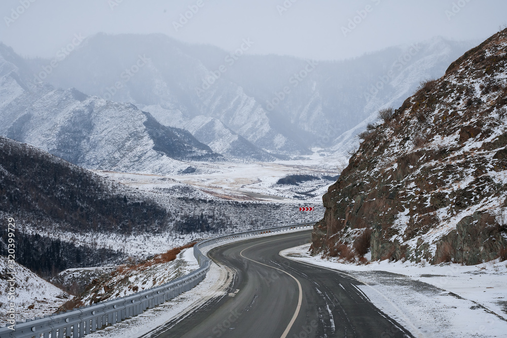 Winter road in mountains. Snow. Winter road in mountains. Snow.