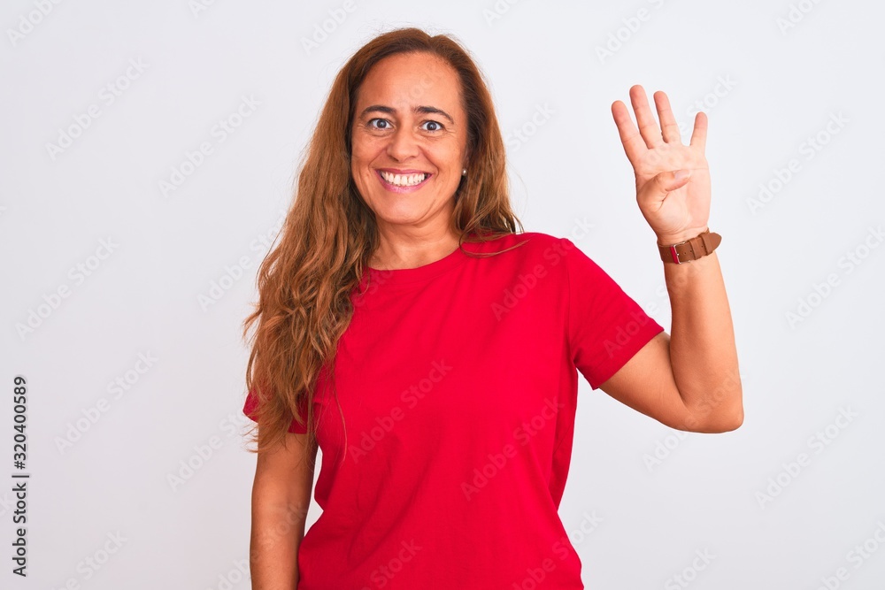 Middle age mature woman standing over white isolated background showing and pointing up with fingers number four while smiling confident and happy. Middle age mature woman standing over white isolated background showing and pointing up with fingers number four while smiling confident and happy.