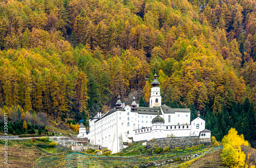 Benedictine Abbey of Monte Maria. The highest located Benedictine Abbey of Europe (1,340 m a.s.l.) rises above Burgusio (Burgeis) in the  Venosta valley, South Tyrol, northern Italy, Europe photo