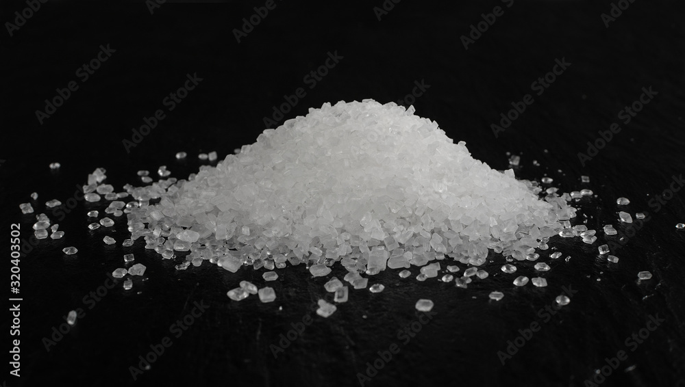 Big Sugar Crystals or Sucrose Crystals on Black Background