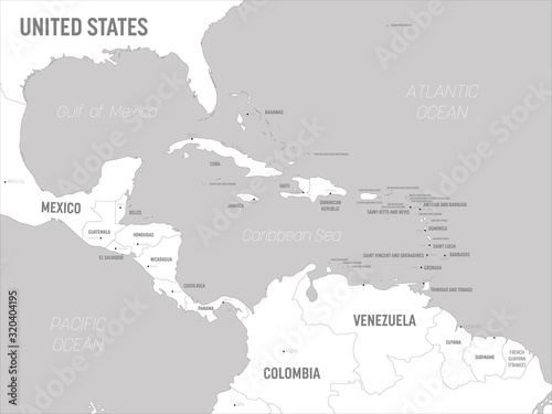 Central America map - white lands and grey water. High detailed political map Central American and Caribbean region with country, capital, ocean and sea names labeling