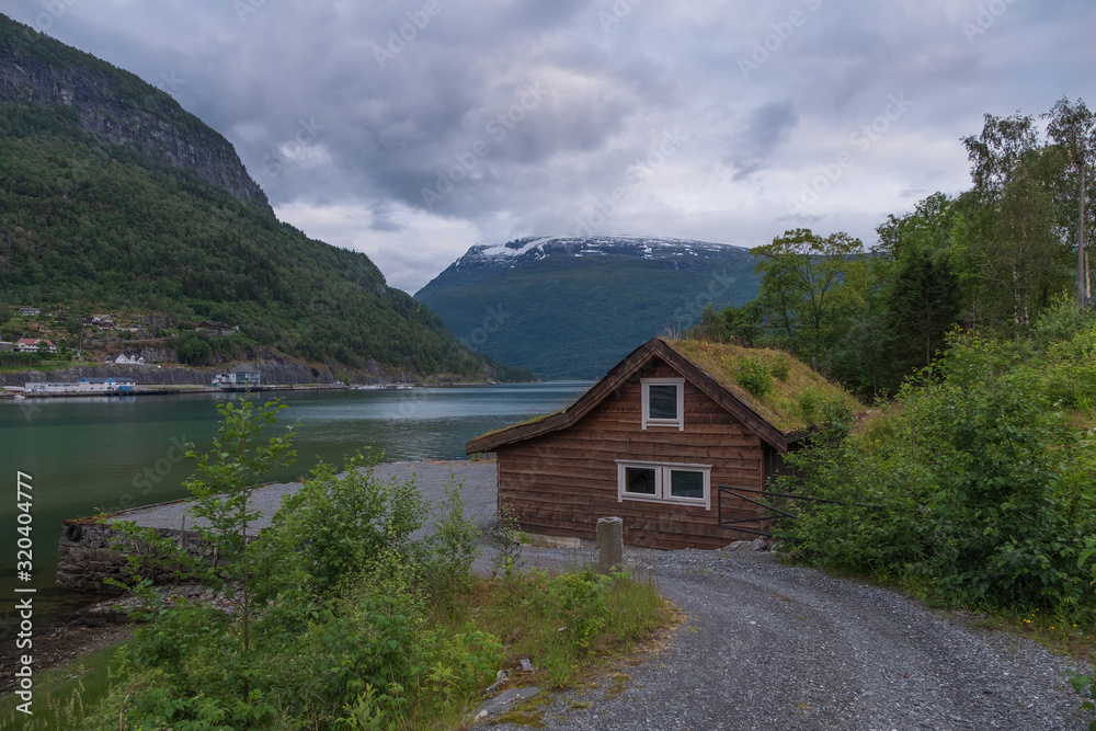 Oldedalen valley - one of the most spectacular areas of natural beauty in Norway. Panorama of town Stryn and river Strynselva. July 2019 Oldedalen valley - one of the most spectacular areas of natural beauty in Norway. Panorama of town Stryn and river Strynselva. July 2019