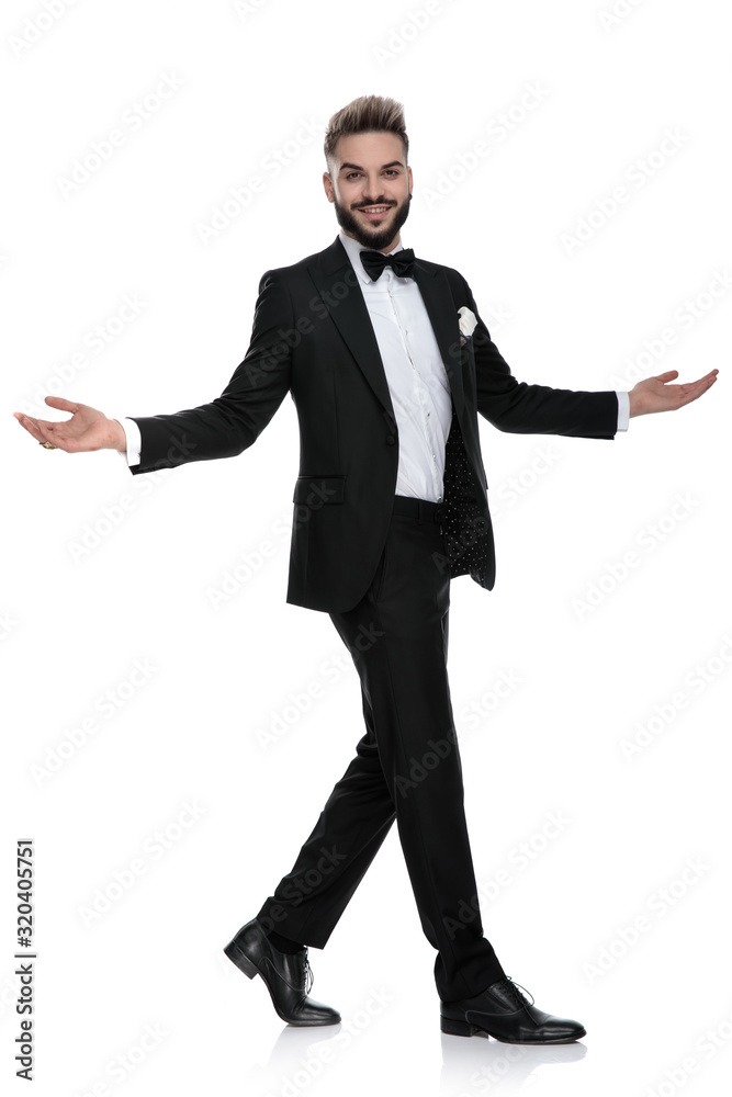 businessman walking aside and greeting with open arms happy businessman walking aside and greeting with open arms happy