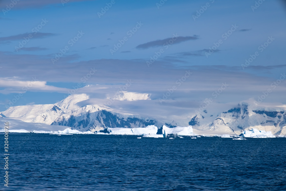 Navigating through breathtaking coastal landscapes along  the Antarctic continent
