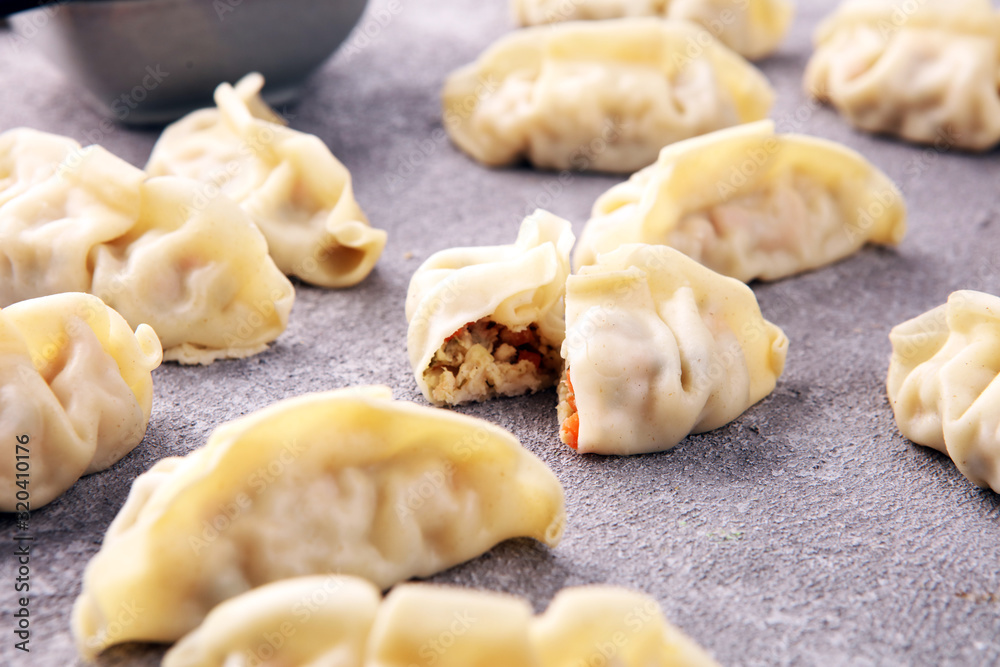 Gyoza or dumplings snack with soy sauce.