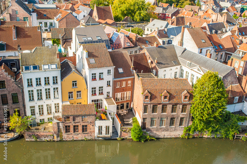 Vibrant street view of downtown Ghent, capital city of east Flanders province, Belgium along Leie river