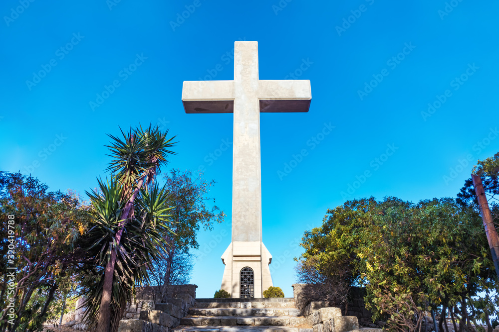 Gigantic cross made of concrete near Monastery of Filerimos on hill of Philerimus (Rhodes, Greece) Gigantic cross made of concrete near Monastery of Filerimos on hill of Philerimus (Rhodes, Greece)