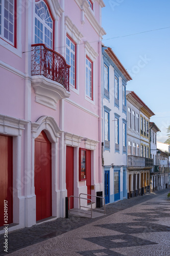 Angrense Theater and colorful houses in in Angra do Herosimo, Terceira, Azores, Portugal