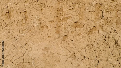 background texture wall of earth and clay on the beach