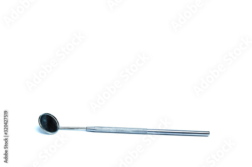 dental mirror on a white background isolation