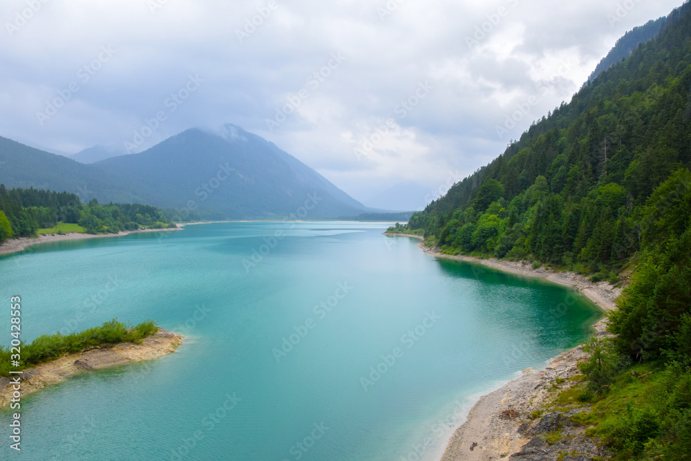 Sylvensteinsee, Baviera / Germany - July 28, 2019: Lake view in the Germany Alps route Sylvensteinsee, Baviera / Germany - July 28, 2019: Lake view in the Germany Alps route