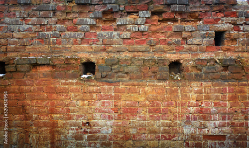 old red brick wall texture or background