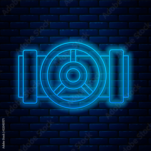 Glowing neon line Industry metallic pipes and valve icon isolated on brick wall background. Vector Illustration