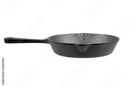 Foto Cast iron pan with handle isolated on white background, side view