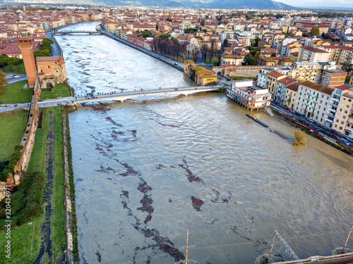 Aerial view of Pisa and the Arno river during a flood, Tuscany, Italy photo