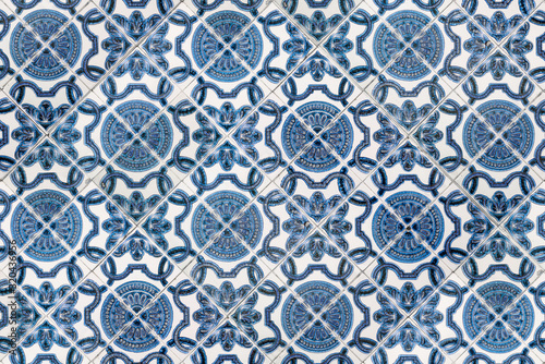 Azulejos is traditional Portuguese tiles. Azulejo is a form of Portuguese painted, tin-glazed, ceramic tile work. Architecture ornament.