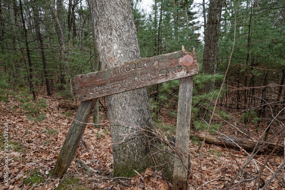 Concord, Massachusetts, USA A wooden sign for the Lincoln Conservation Land Concord, Massachusetts, USA A wooden sign for the Lincoln Conservation Land