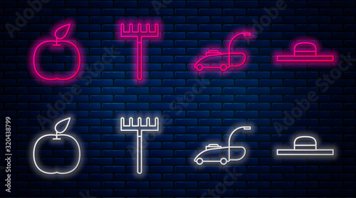Set line Garden rake, Lawn mower, Apple and Worker hat. Glowing neon icon on brick wall. Vector