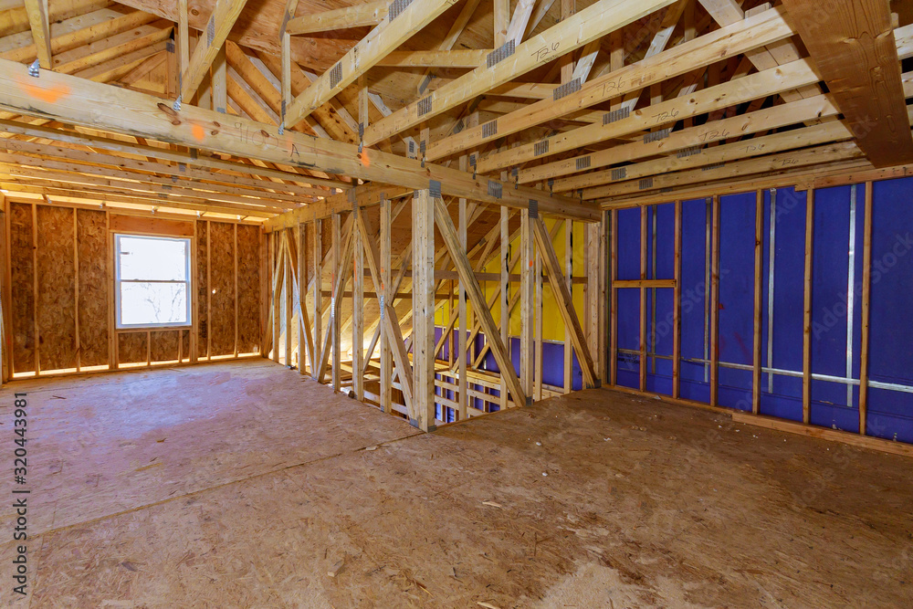Interior view construction wall of an apartment attic of new frame new house residential Interior view construction wall of an apartment attic of new frame new house residential