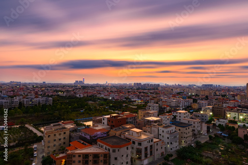 long exposure of residential area in a chinese suburb in sunset time