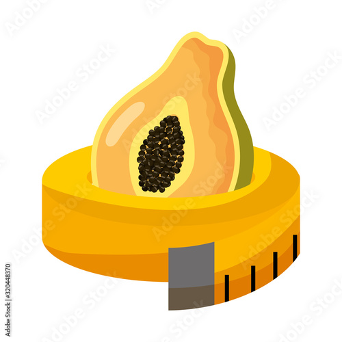 tropical papaya fruit with tape measure